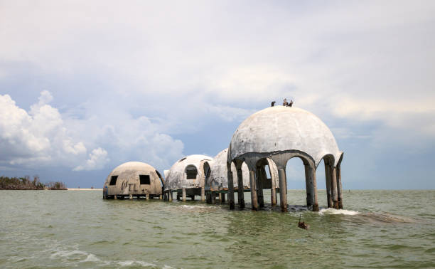 istock Blue sky over the Cape Romano dome house ruins 1011605208