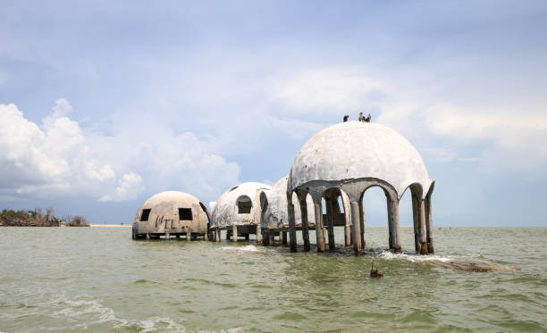istock Blue sky over the Cape Romano dome house ruins 1011605210