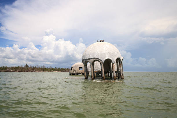 istock Blue sky over the Cape Romano dome house ruins 1011605252