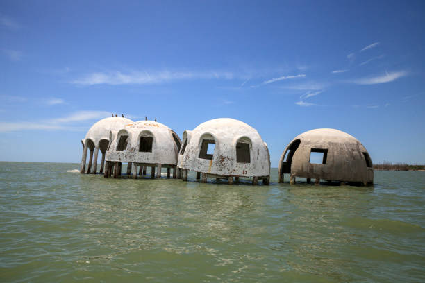 istock Blue sky over the Cape Romano dome house ruins 1011605288