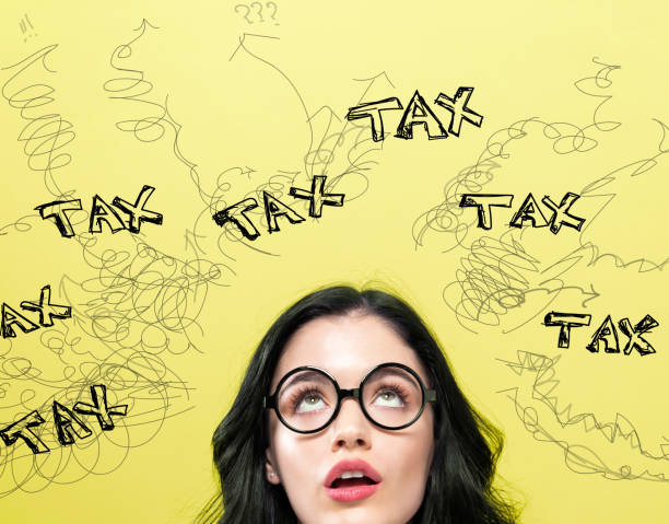 istock Tax with young woman 1011605878