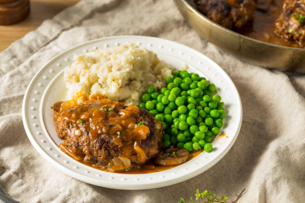 homemade savory salisbury steaks - salisbury steak imagens e fotografias de stock