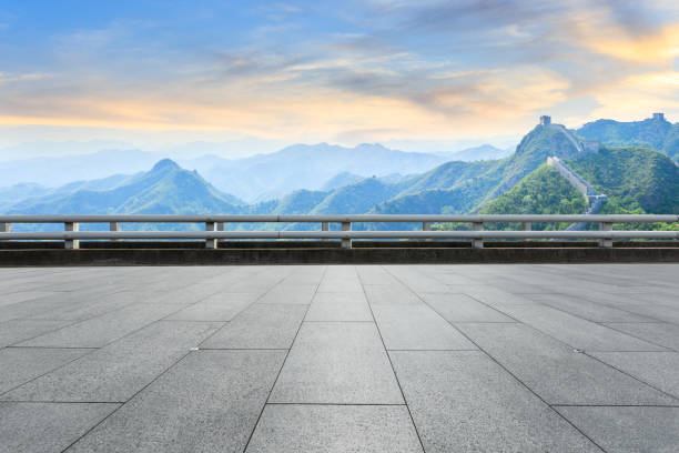 istock Square floor and and great wall with mountains 1011616214