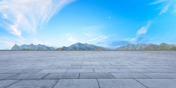 istock Square floor and great wall with mountains 1011621416