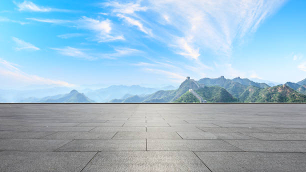 istock Square floor and great wall with mountains 1011621560