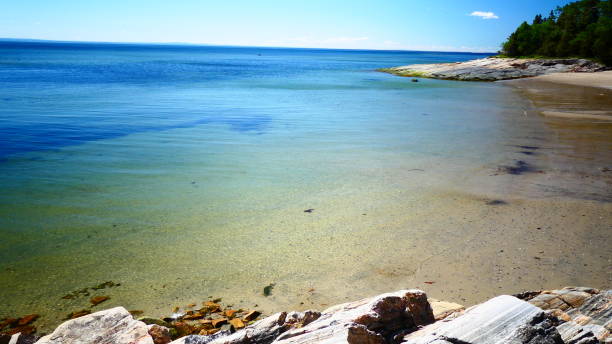 istock Beach between the rocks in Tadoussac 1011626800