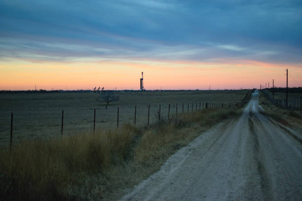 American Oil Wells Texas Wells in the Permian being Drilled and Fracked wellhead stock pictures, royalty-free photos & images