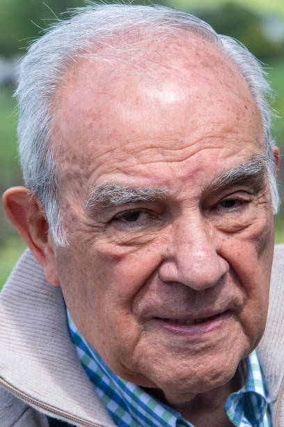 istock Pensive senior man looking at the camera 1011639666
