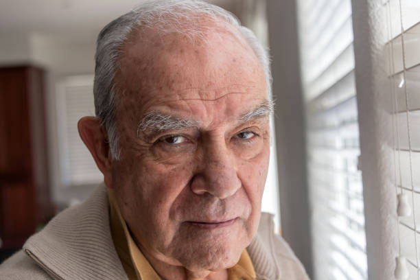 istock Senior man posing near a window 1011640226