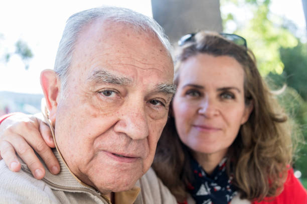 istock senior man posting with his daughter 1011640260