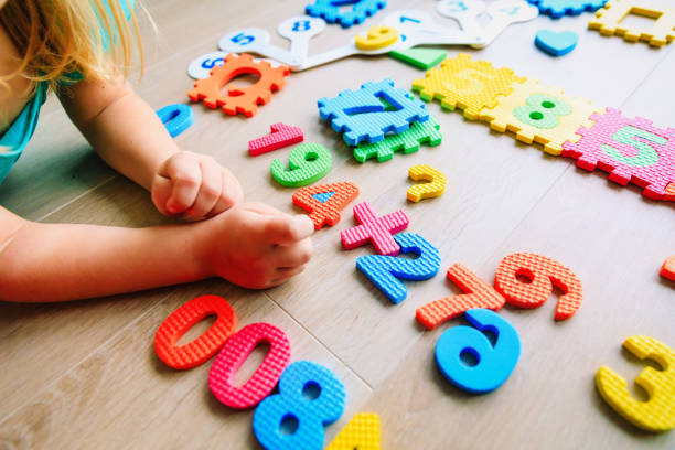 istock little girl learning numbers and math 1011645726