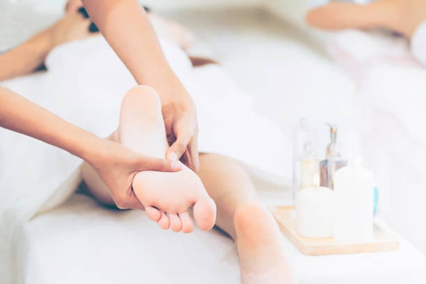 istock Foot spa massage treatment in luxury spa resort. 1011654002