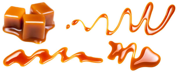 istock Caramel splashes isolated on white background. Spilled caramel sauce, toffee toppings 1011664728