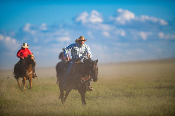 istock Cowboys Horseback Riding 1011664858