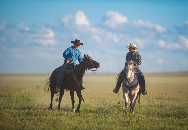 istock Cowboys Horseback Riding 1011664862