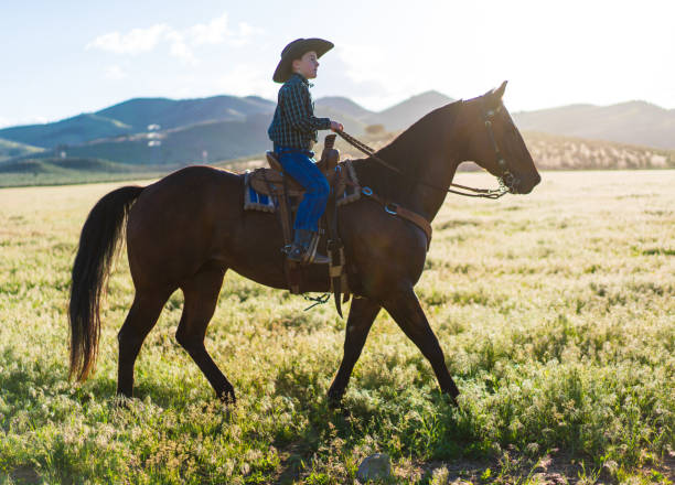 istock Little kid horseback riding 1011665166