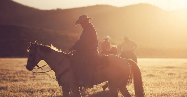 istock Cowboys Horseback Riding 1011667814