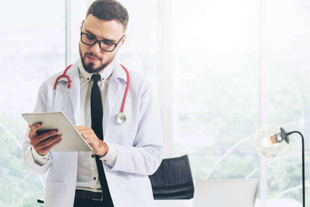 istock Doctor working on tablet computer in the hospital. 1011675690