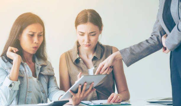 istock Multicultural businesswomen in group meeting. 1011683074