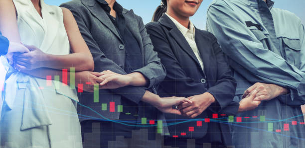 istock Double exposure business people holding hands. 1011683416