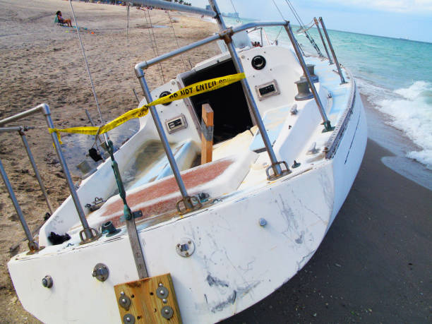 istock Adandoned Sailboat at the Beach 1011690674