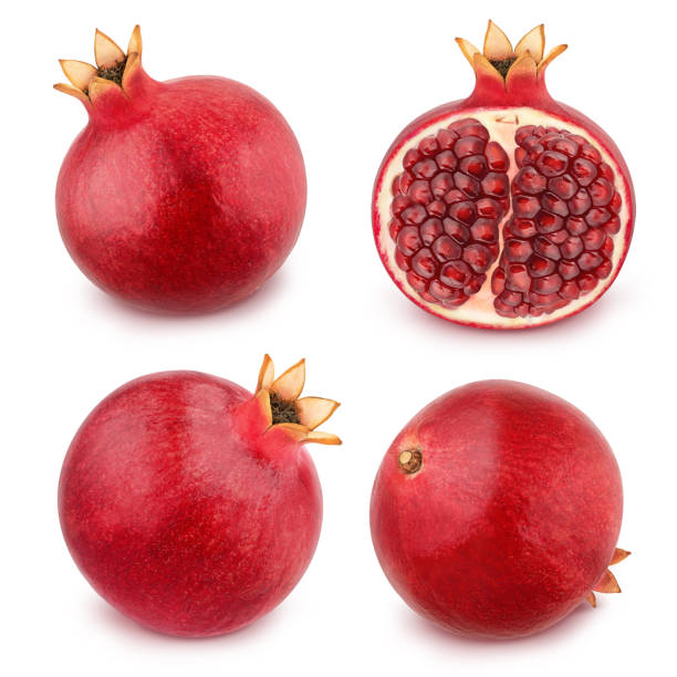 istock Set of pomegranates isolated on a white. 1011704402