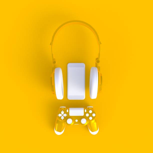 istock Yellow joystick with yellow headphones and smart phone on yellow table background, Computer game competition, Gaming concept, 3D rendering 1011714932