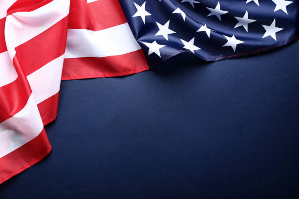 istock American flag on blue background 1011718024