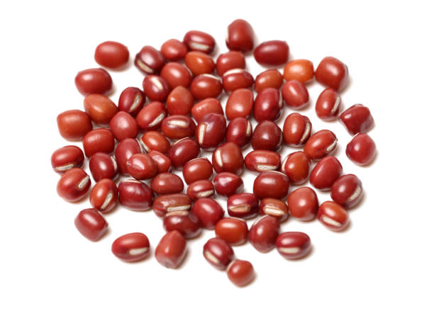 istock Adzuki Bean in wood spoon on white background 1011720770