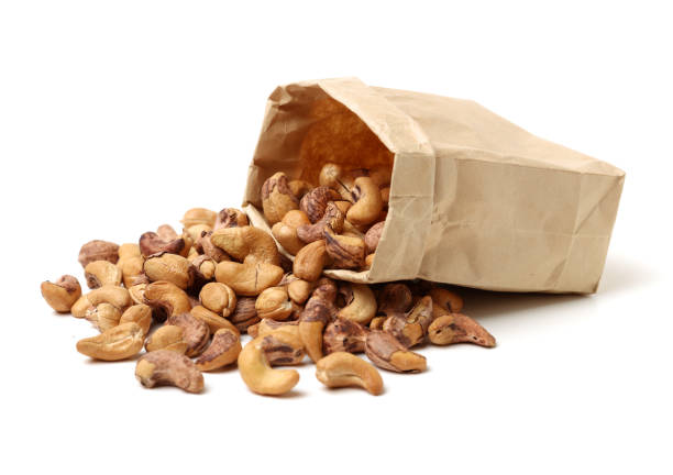 istock Roasted cashews isolated on a white background 1011721084