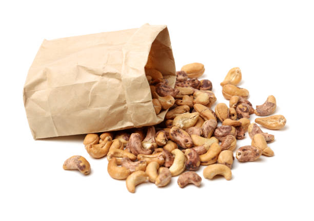 istock Roasted cashews isolated on a white background 1011721096
