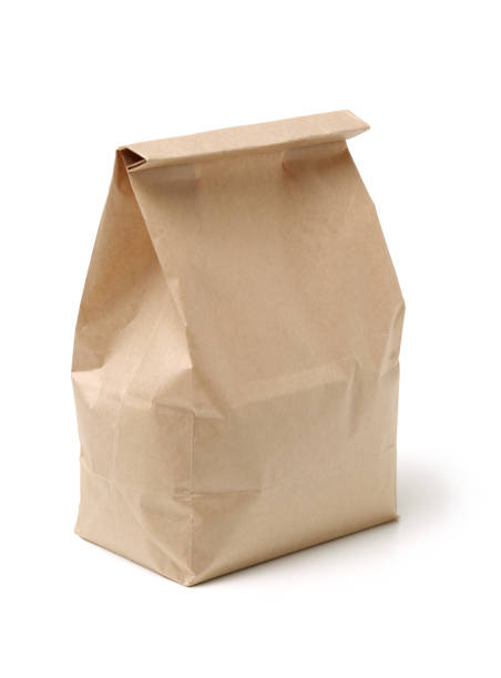 istock Paper lunch bag isolated on white background 1011721158