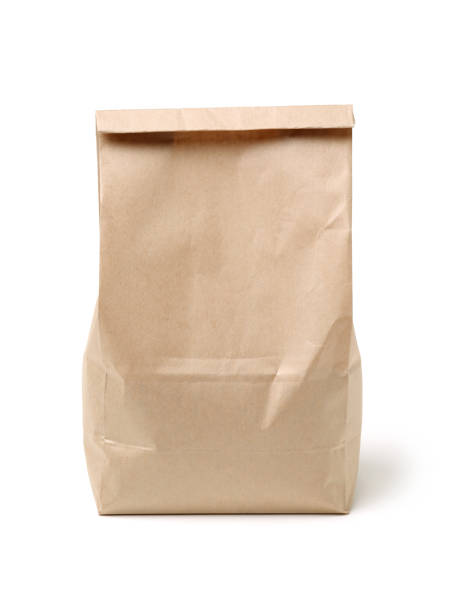 istock Paper lunch bag isolated on white background 1011721246