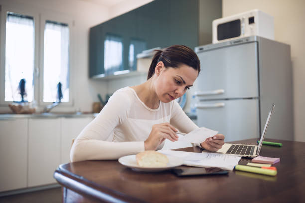 istock Young women working at home, using laptop 1011729002