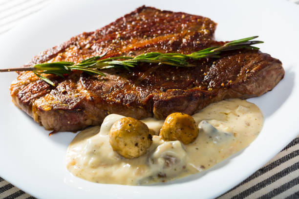 istock Roasted veal steak with mushroom sauce 1011729072