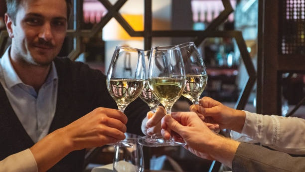 istock Businessman toasting with colleagues 1011733806