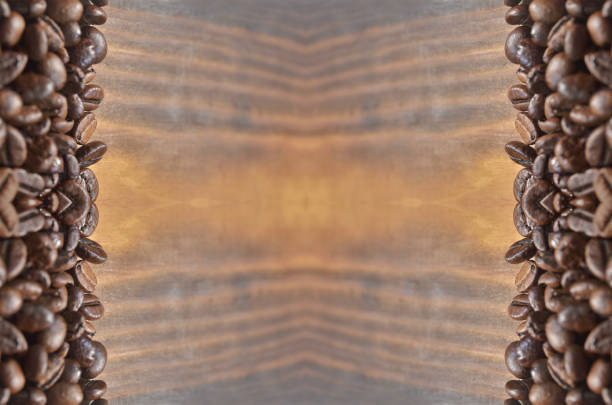 Coffee beans on a dark wooden background. Large size, billboard, background, texture, wallpaper