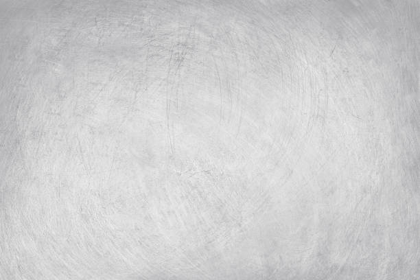 istock aluminium texture background, scratches on stainless steel. 1011746716
