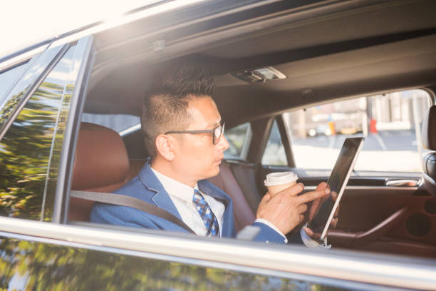 istock Chinese businessman at car 1011762064