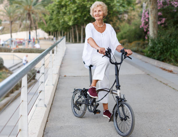 istock Elderly woman going to biking 1011763574