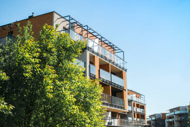 istock Modern, luxury apartment building with glass balconies. 1011763788