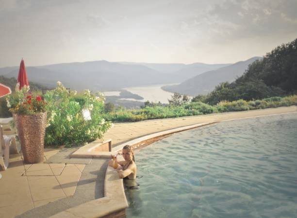 istock Pool in front of a landscape 1011763856