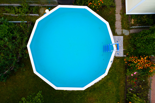 Swimming pool with blue clear water. Aerial photography.
