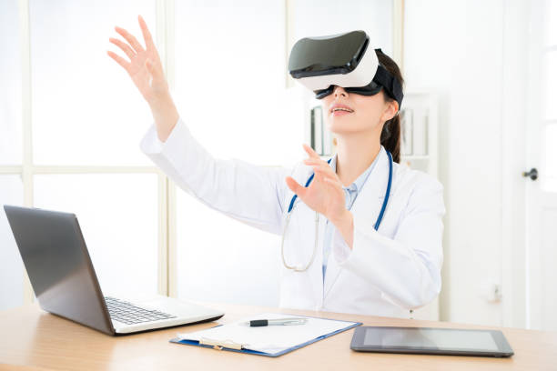istock attractive pretty doctor wearing VR technology 1011771694