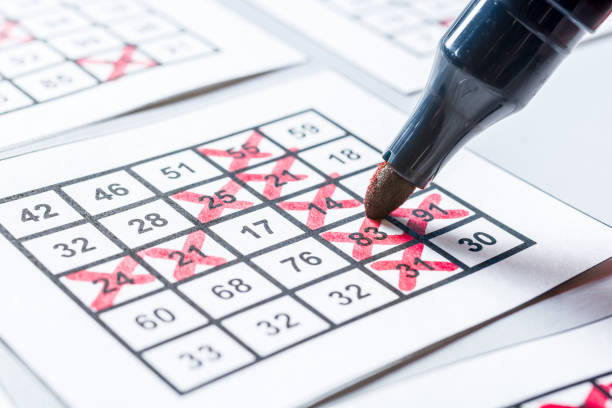 istock Bingo lot is filled in with red pencil 1011772916