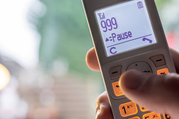 istock Telephone receiver with dialed emergency number 1011772980