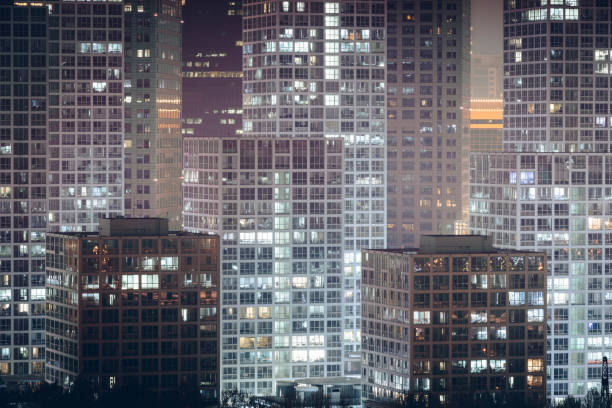 istock Glass curtain wall building in modern cities 1011788942