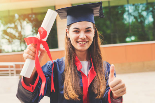 istock Young female students graduating from university 1011791856