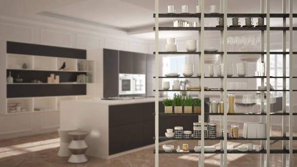 istock Kitchen living room shelving system foreground close-up, interior design concept, white and gray modern room open plan in the background 1011792200