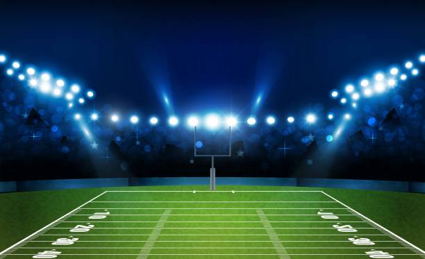 istock American football arena field with bright stadium lights design. Vector illumination 1011792288